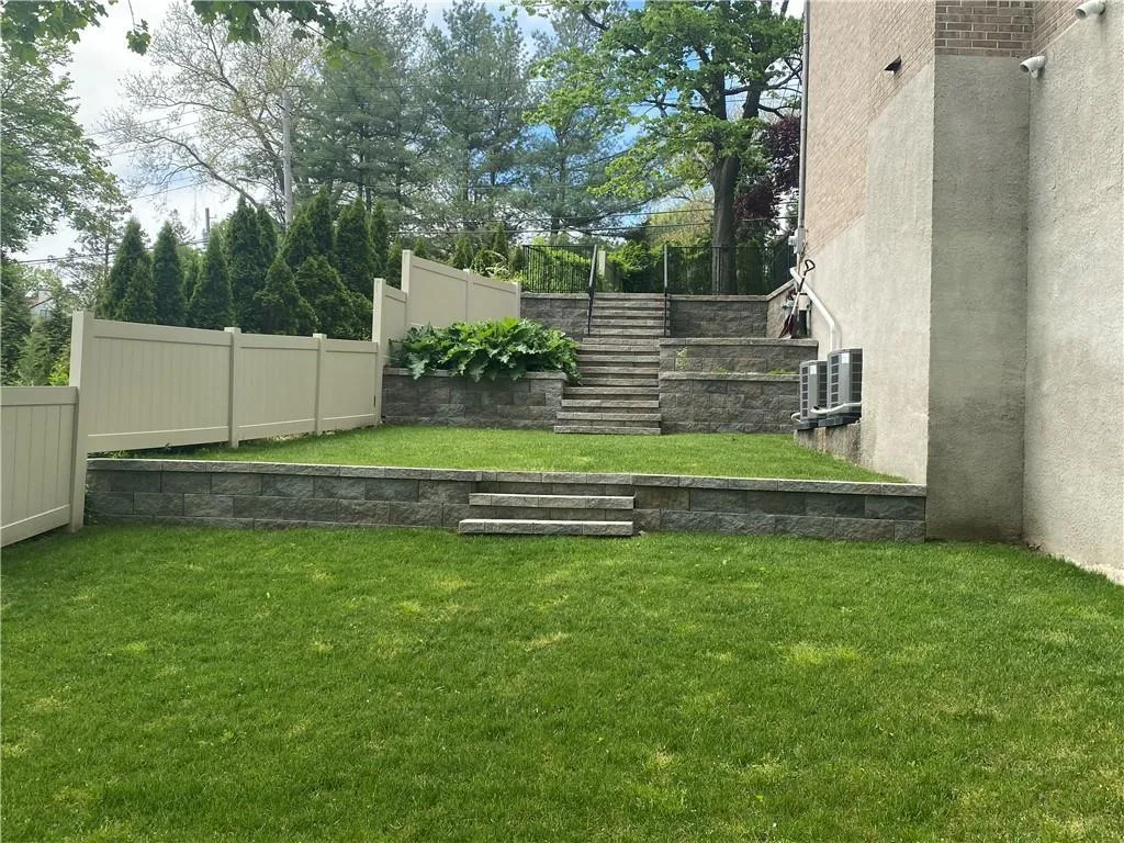 View of yard with stairs View of yard with stairs