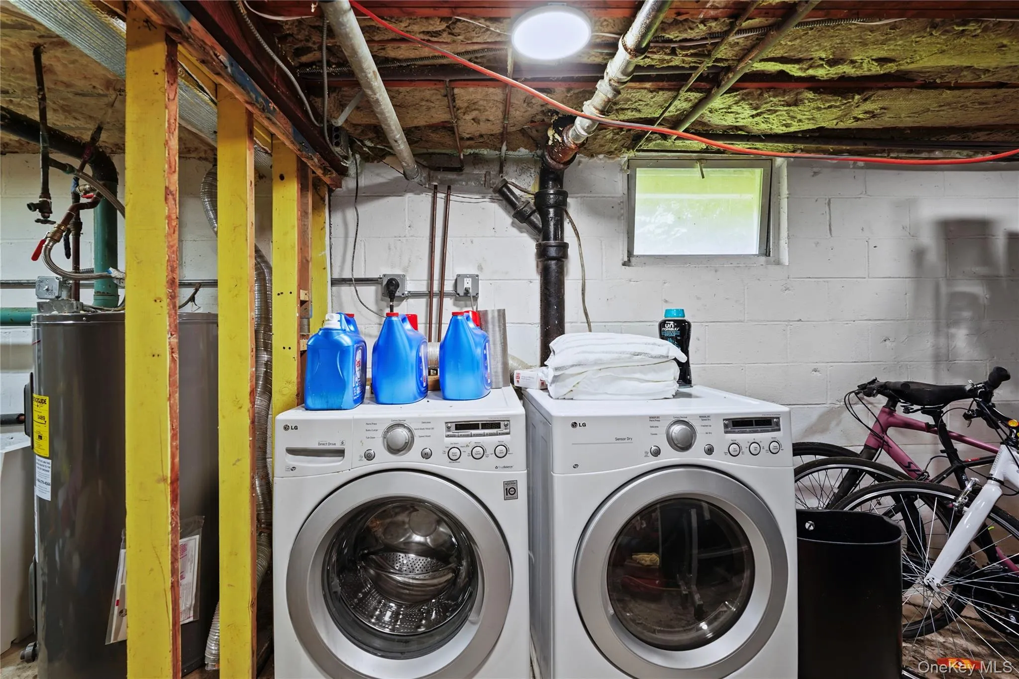 Washer, dryer & electric water heater located in the basement Washer, dryer & electric water heater located in the basement