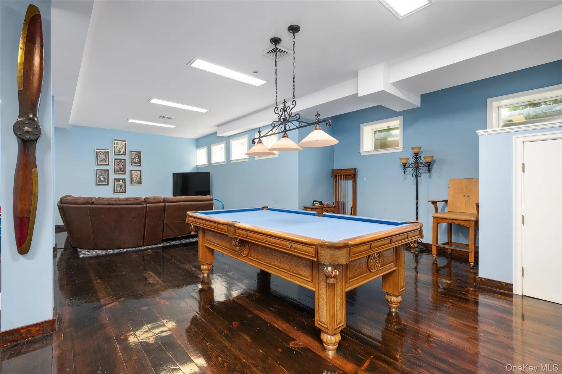 Playroom featuring wood-type flooring and pool table Playroom featuring wood-type flooring and pool table