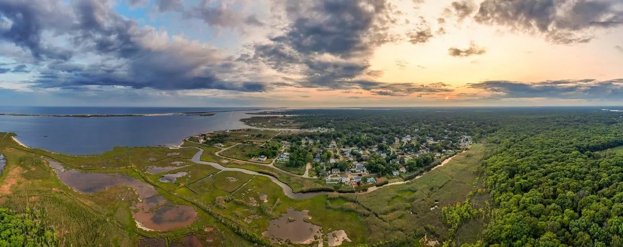 Aerial overview of property's location with a large body of water Aerial overview of property's location with a large body of water