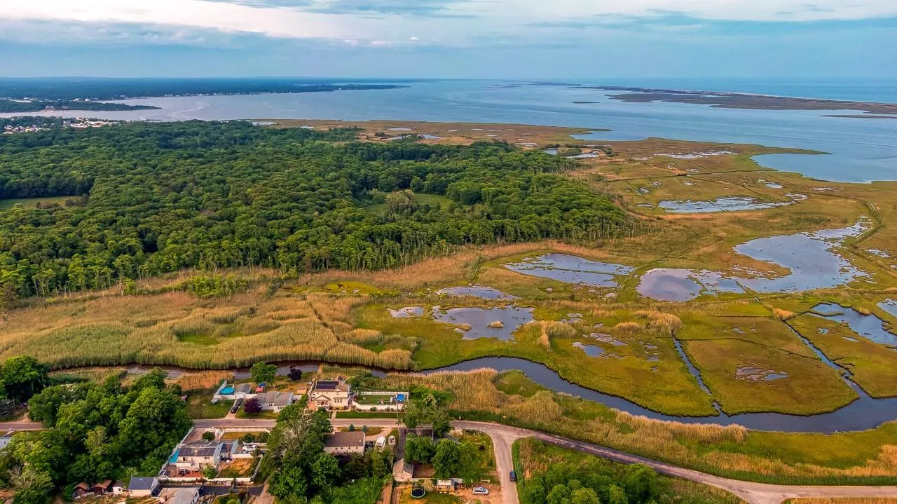 Aerial overview of property's location featuring a nearby body of water Aerial overview of property's location featuring a nearby body of water