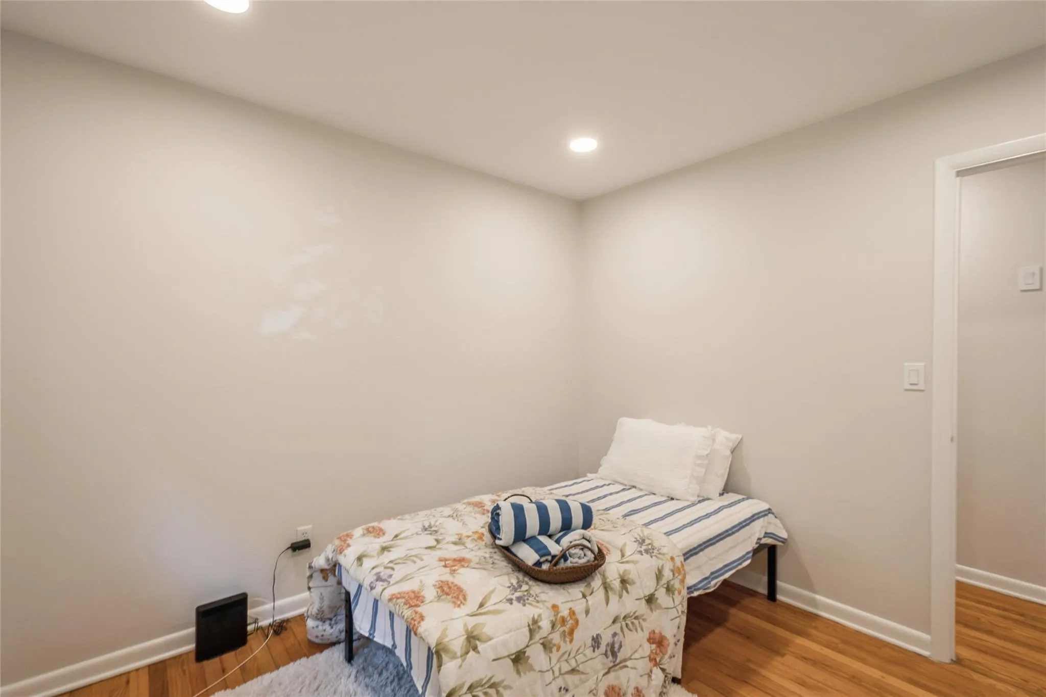 Bedroom with hardwood floors Bedroom with hardwood floors