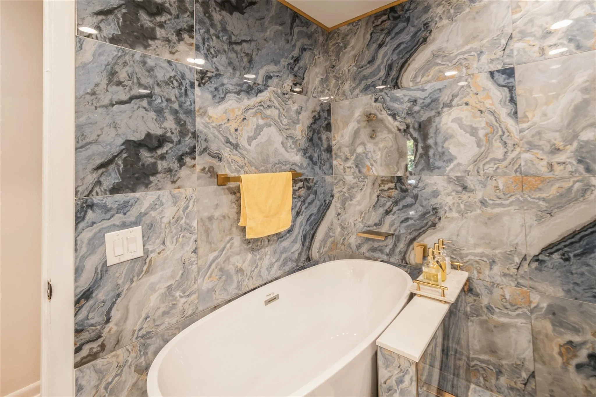 Beautifully updated bathroom with tub and walk-in shower Beautifully updated bathroom with tub and walk-in shower