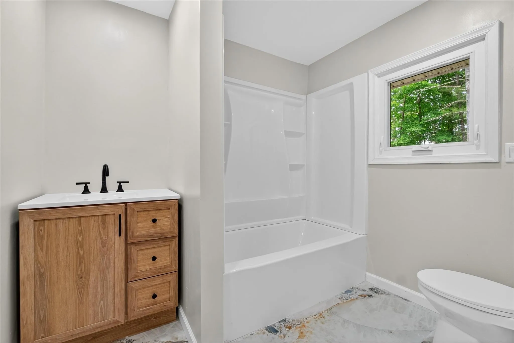 Bathroom with shower / bath combination and vanity Bathroom with shower / bath combination and vanity