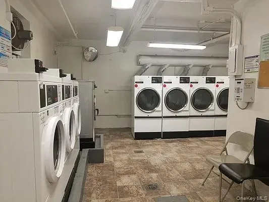 Community laundry room with independent washer and dryer Community laundry room with independent washer and dryer