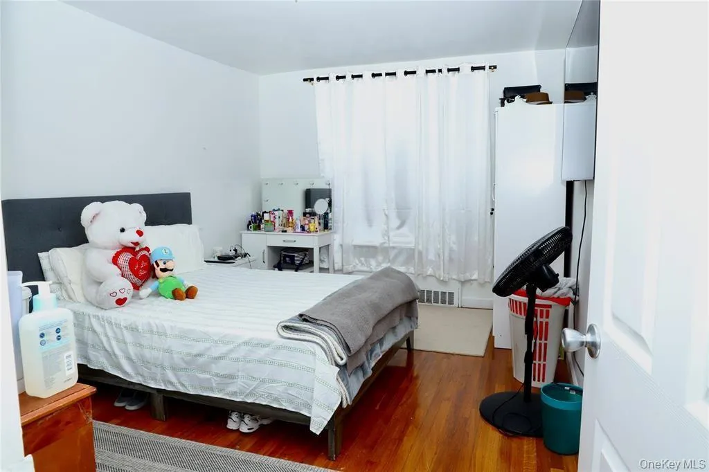 Bedroom with wood finished floors Bedroom with wood finished floors