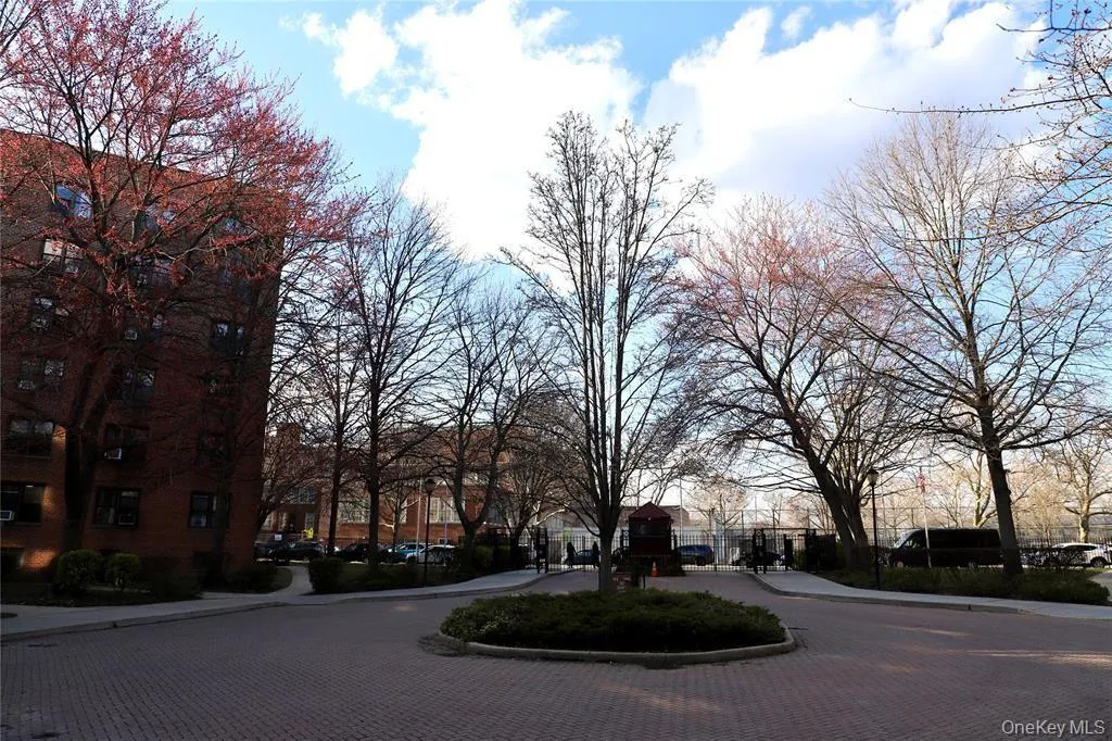 View of decorative street with sidewalks and curbs View of decorative street with sidewalks and curbs