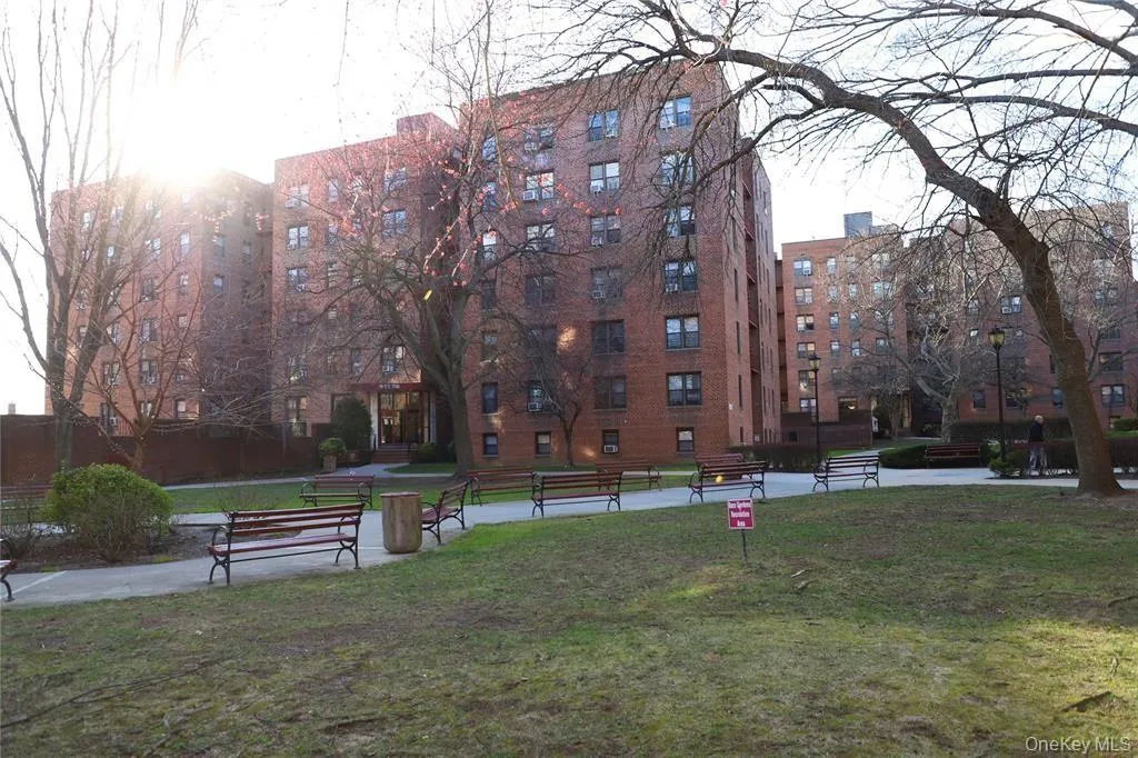 View of home's community with a lawn View of home's community with a lawn