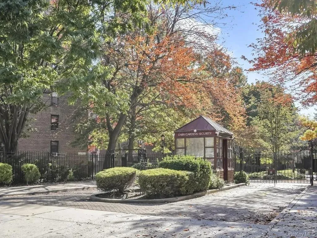 View of home's community featuring a gate View of home's community featuring a gate
