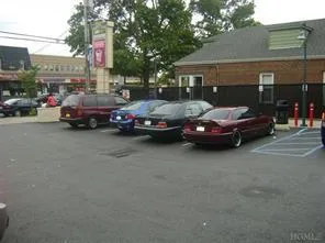 View of uncovered parking lot View of uncovered parking lot