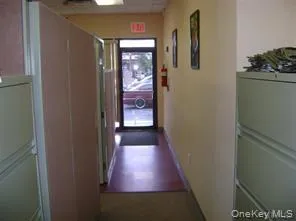 Hallway featuring baseboards Hallway featuring baseboards