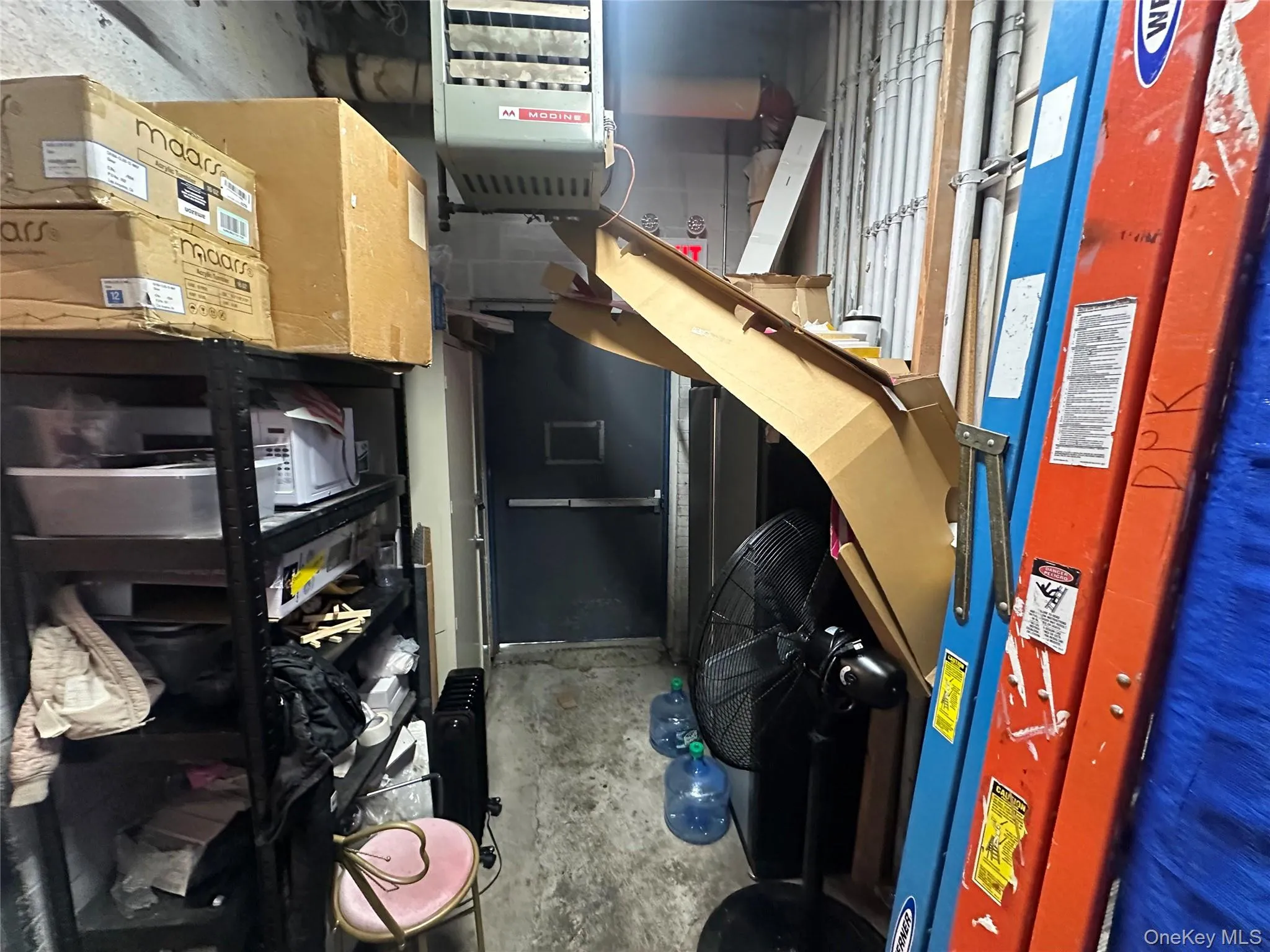 Storage area featuring a heating unit Storage area featuring a heating unit