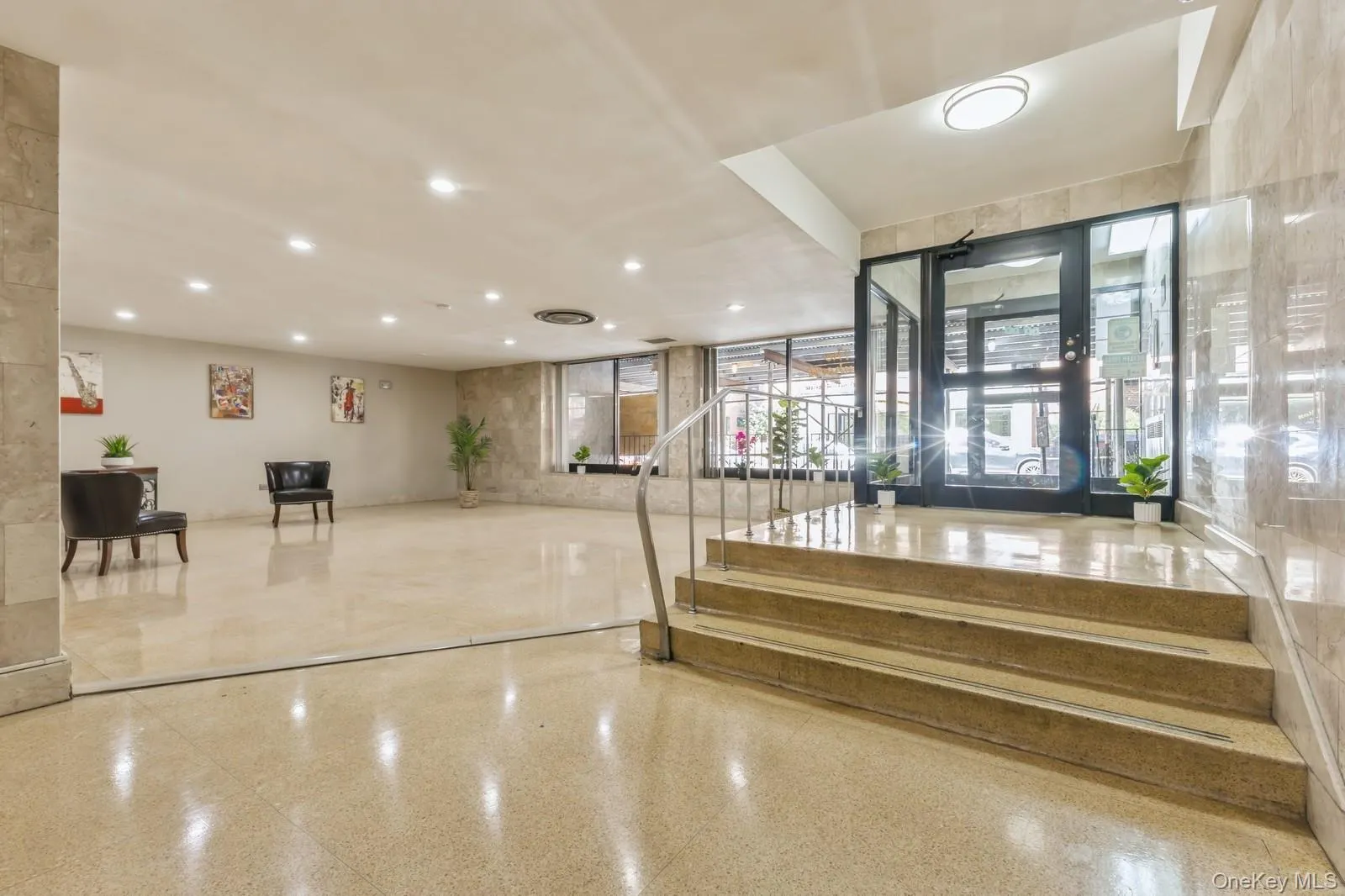 Common area with stairs and recessed lighting Common area with stairs and recessed lighting