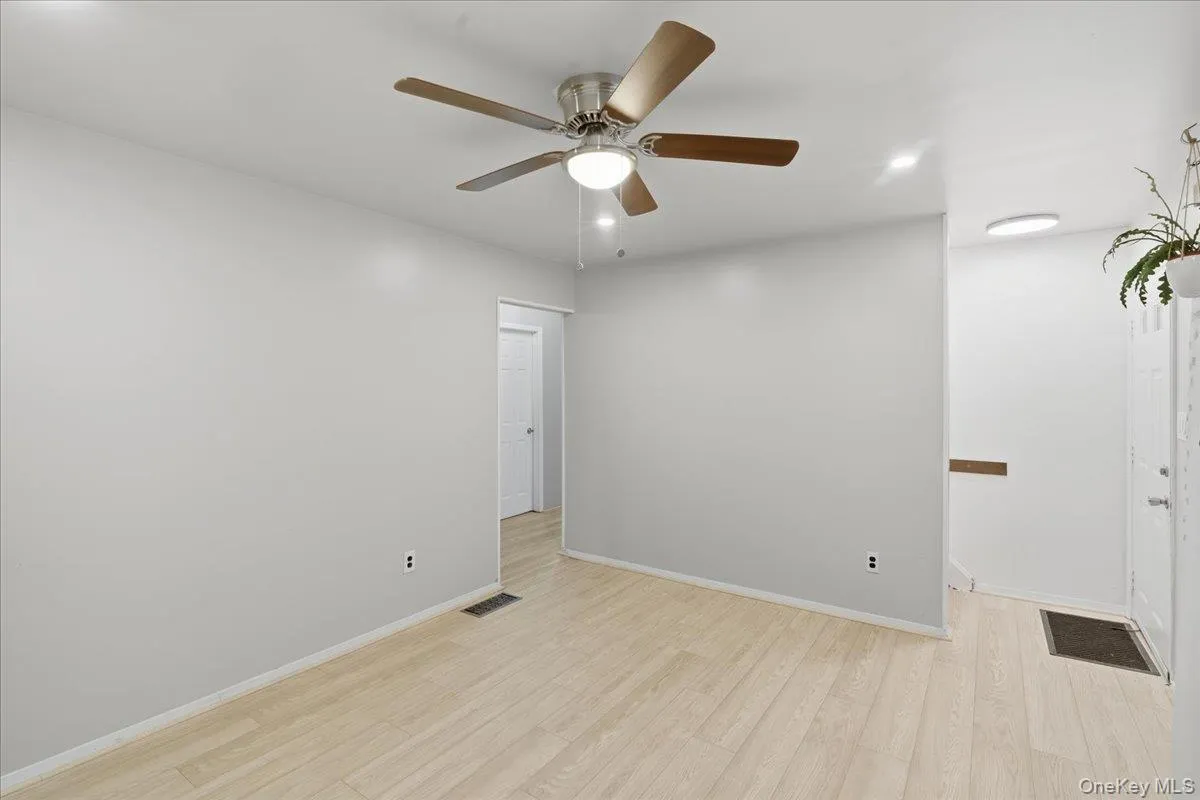 Unfurnished room with light wood-style flooring, recessed lighting, and ceiling fan Unfurnished room with light wood-style flooring, recessed lighting, and ceiling fan