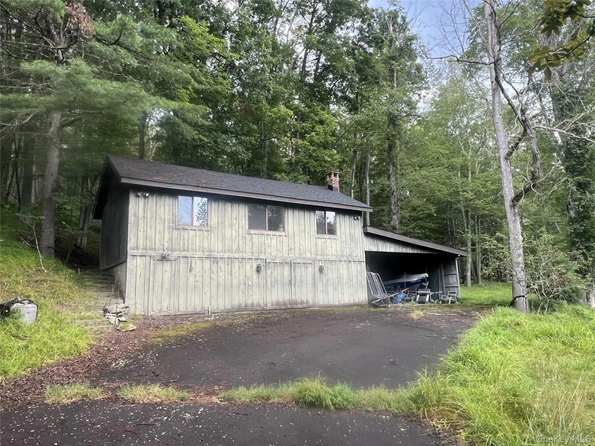 View of outdoor structure with a carport View of outdoor structure with a carport