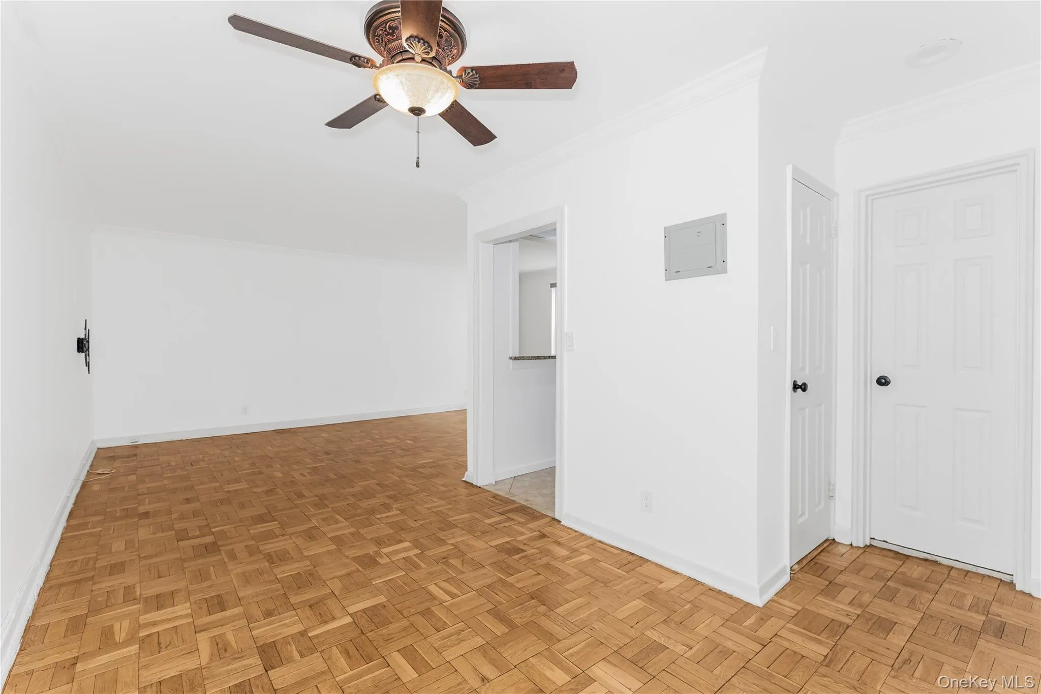 Dining area with ornamental molding and ceiling fan Dining area with ornamental molding and ceiling fan