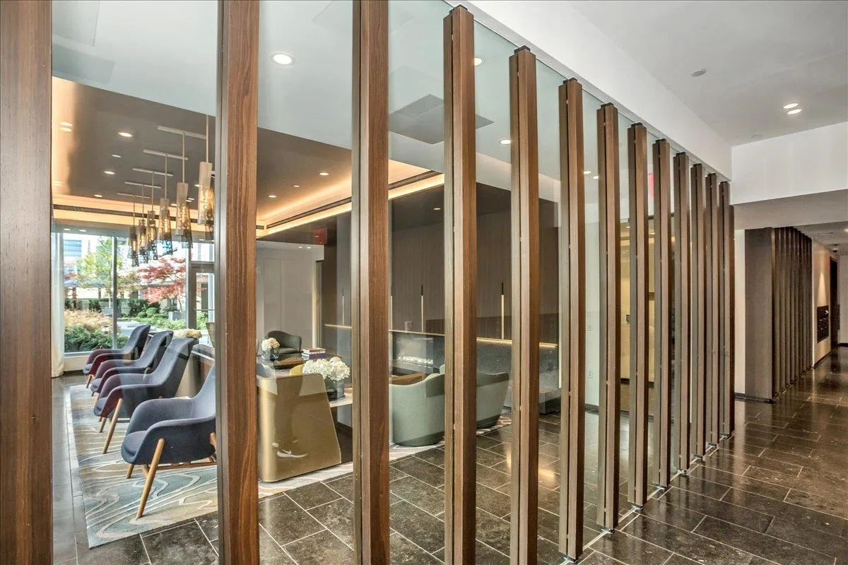 Building lobby featuring recessed lighting Building lobby featuring recessed lighting
