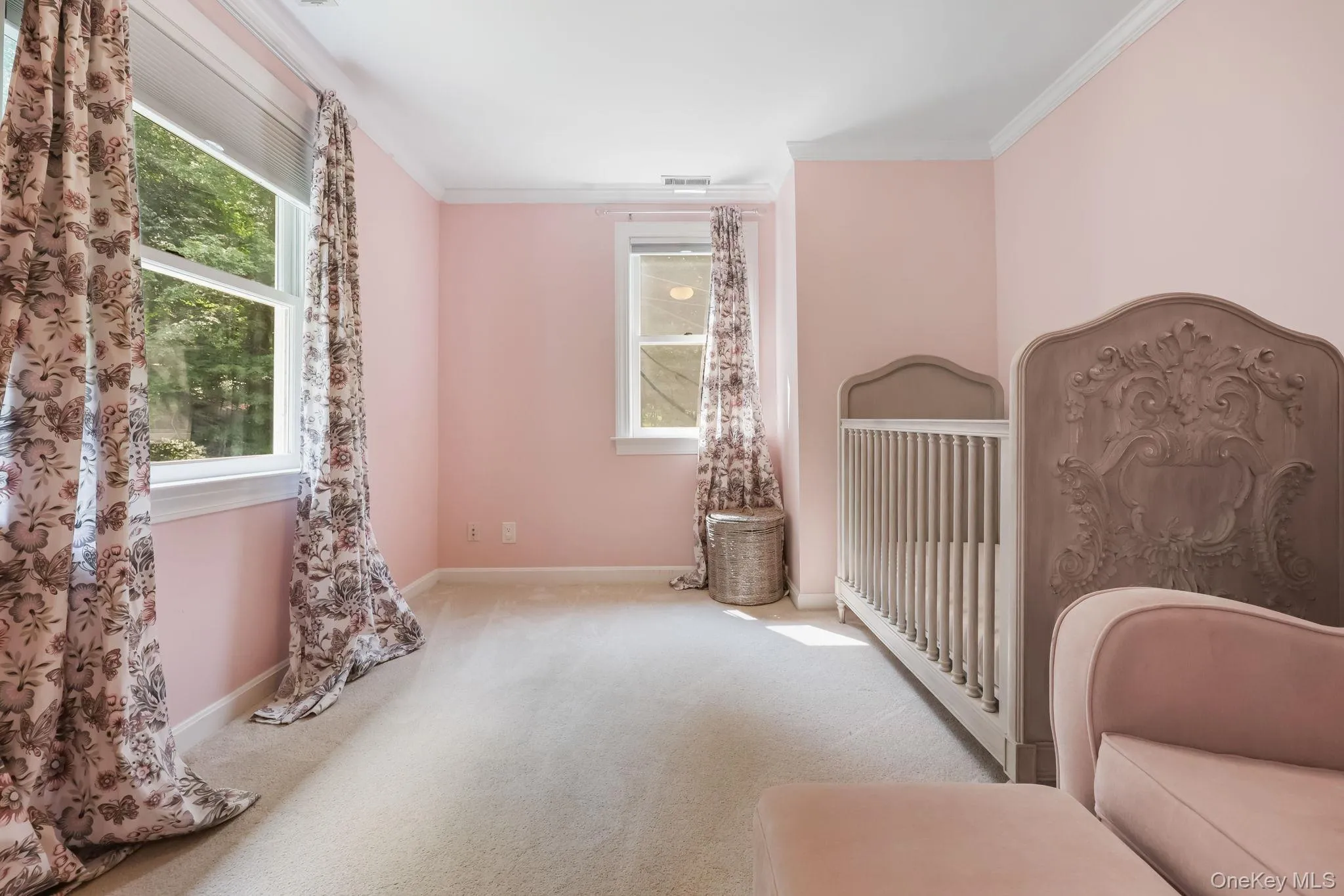 Unfurnished bedroom with ornamental molding and carpet floors Unfurnished bedroom with ornamental molding and carpet floors