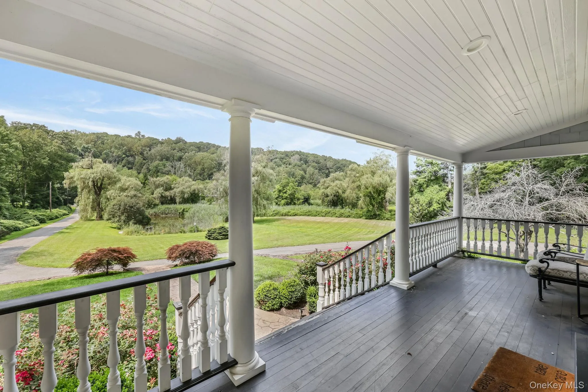 Wooden porch with a wooded view Wooden porch with a wooded view
