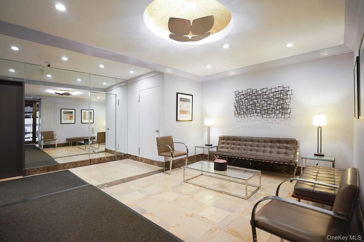 Common area featuring recessed lighting and crown molding Common area featuring recessed lighting and crown molding