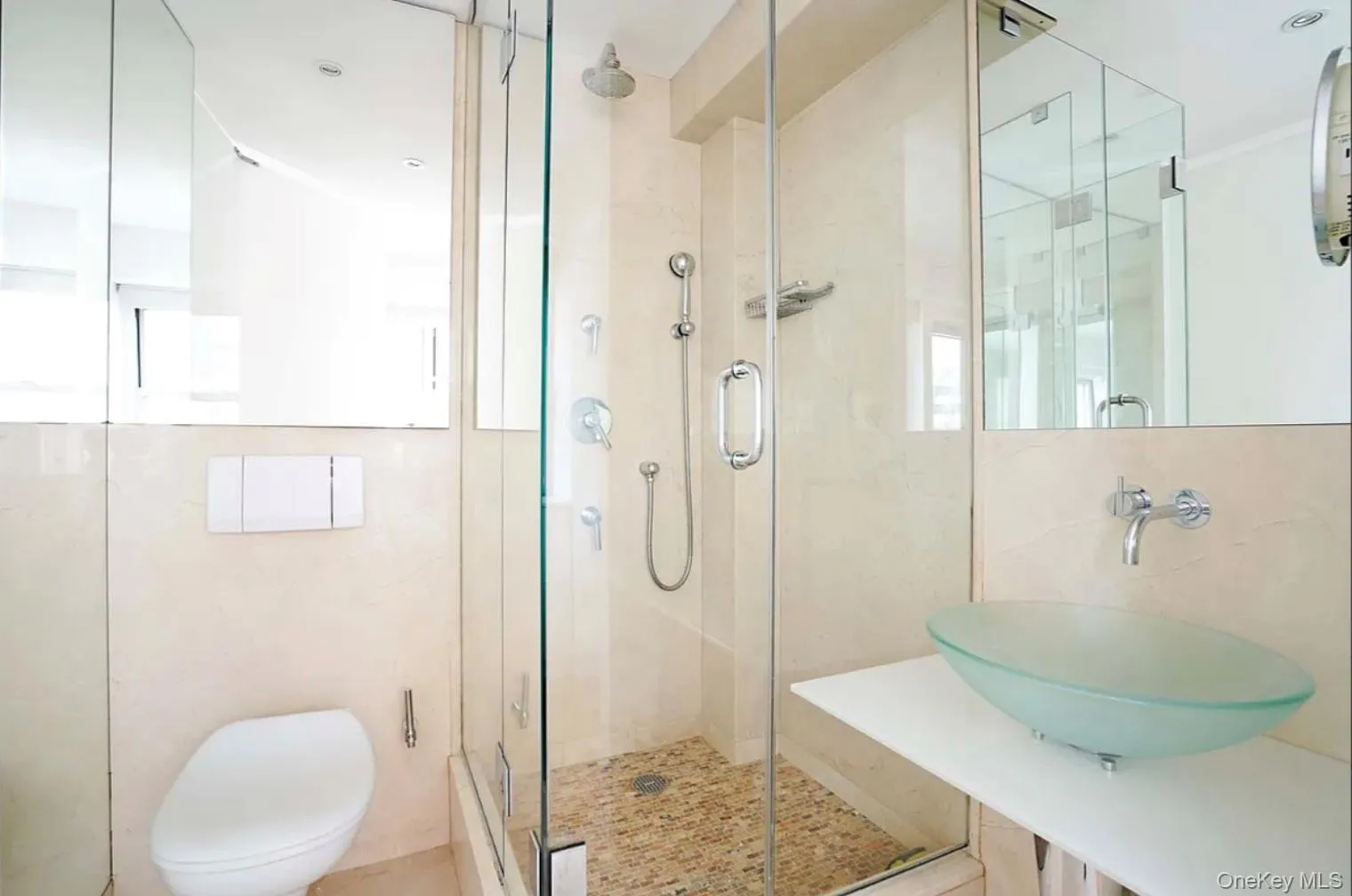 Full bath featuring a stall shower Full bath featuring a stall shower
