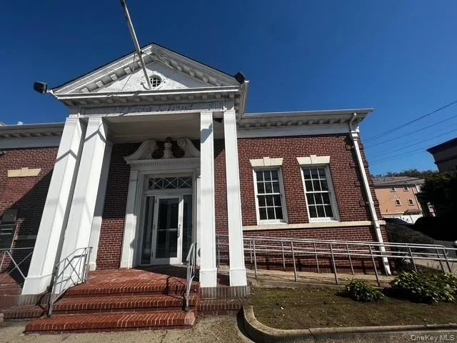 View of front facade featuring brick siding View of front facade featuring brick siding