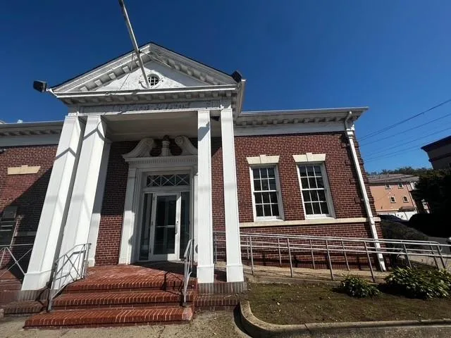 View of front facade featuring brick siding View of front facade featuring brick siding