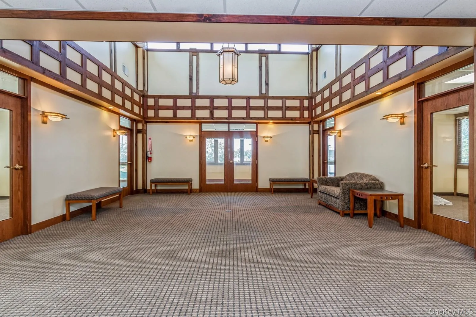 Building lobby featuring a towering ceiling Building lobby featuring a towering ceiling