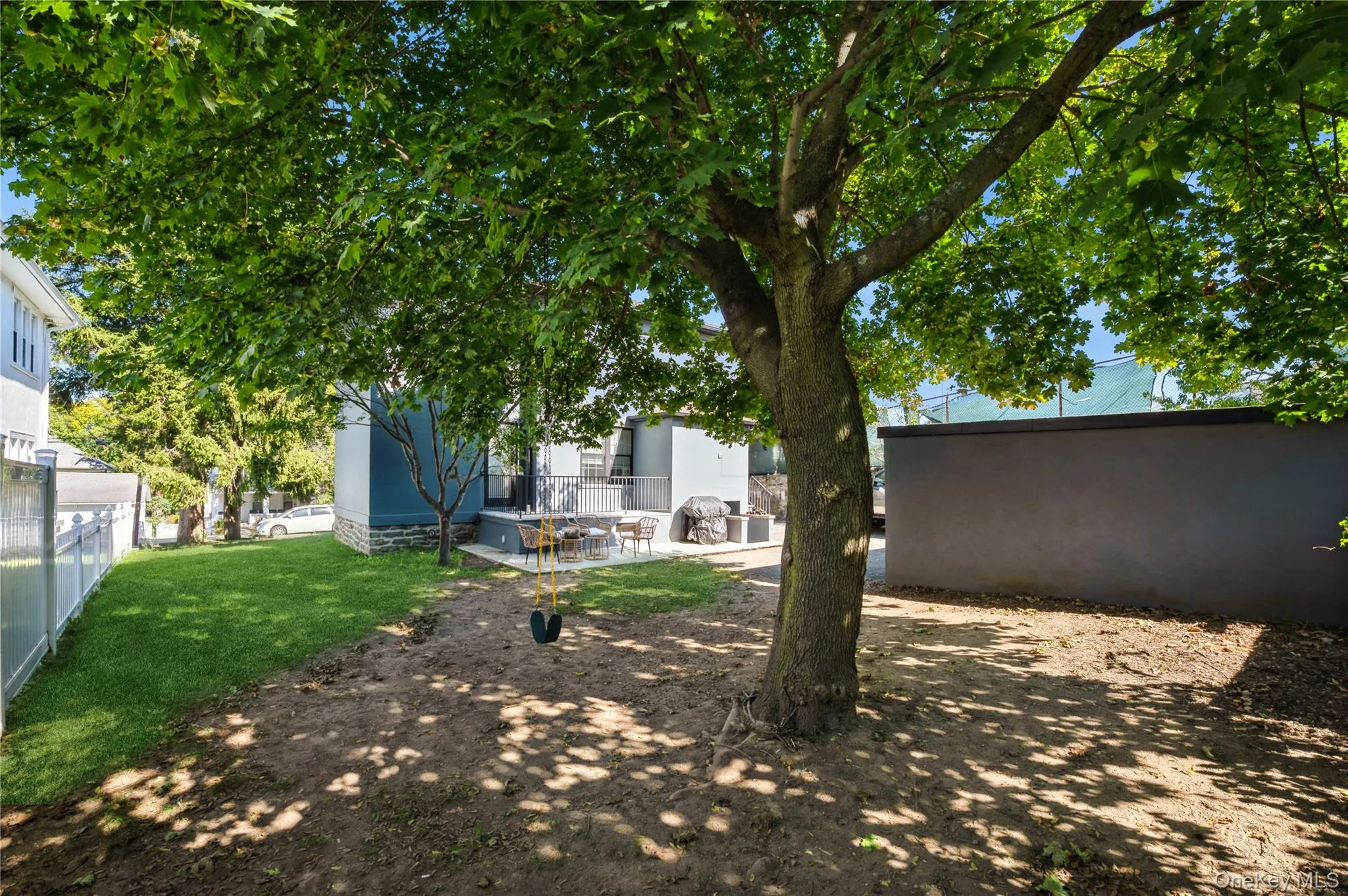 View of yard featuring a patio View of yard featuring a patio