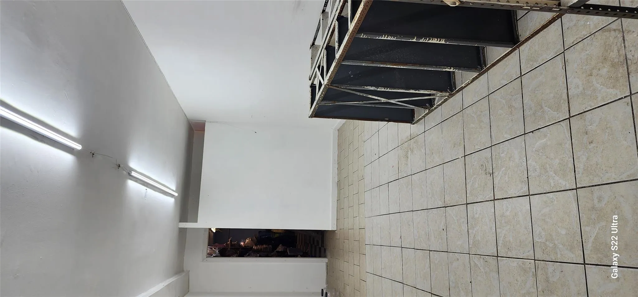 Empty room featuring light tile patterned flooring Empty room featuring light tile patterned flooring