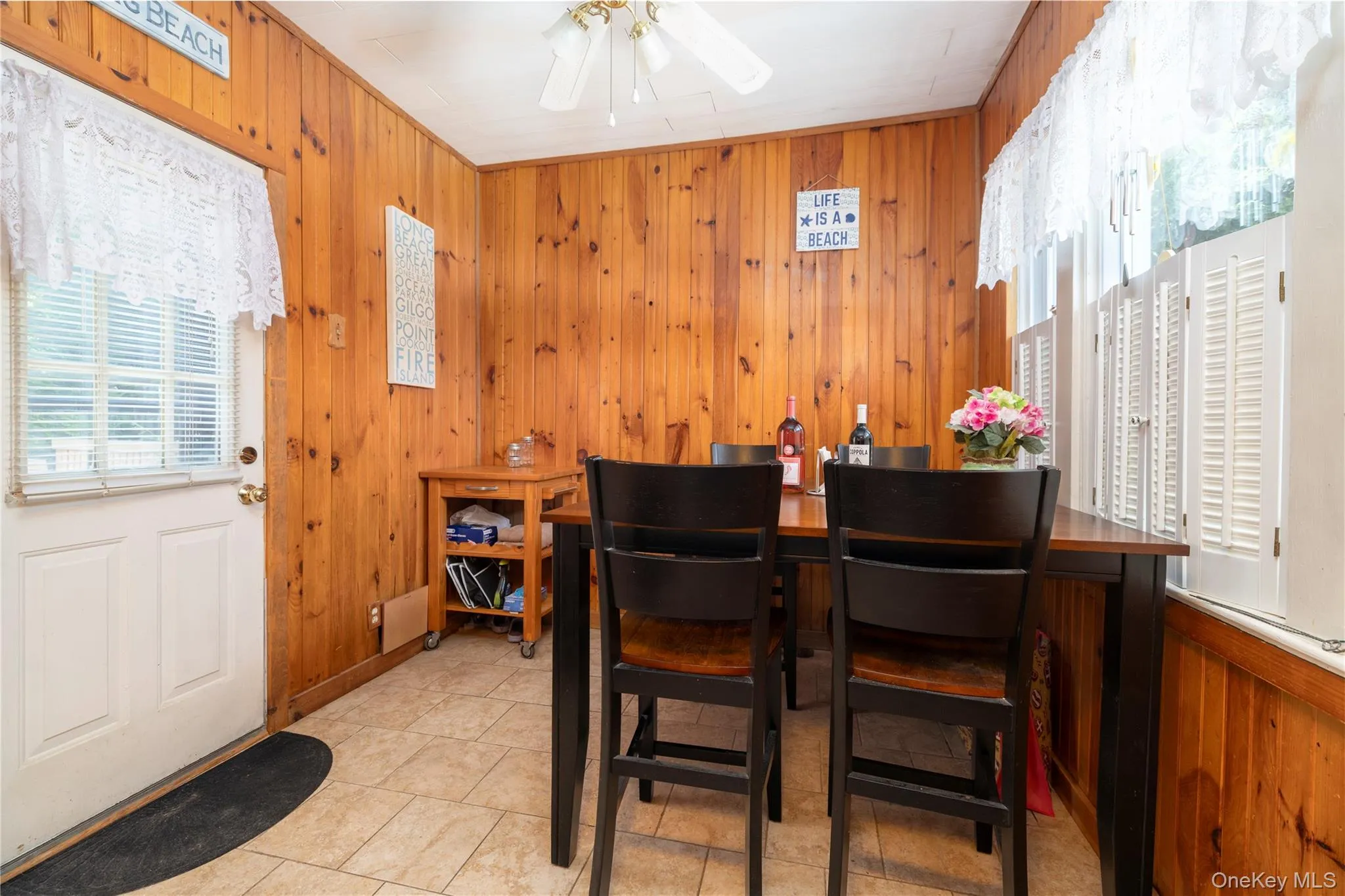 Dining Space with wood walls Dining Space with wood walls