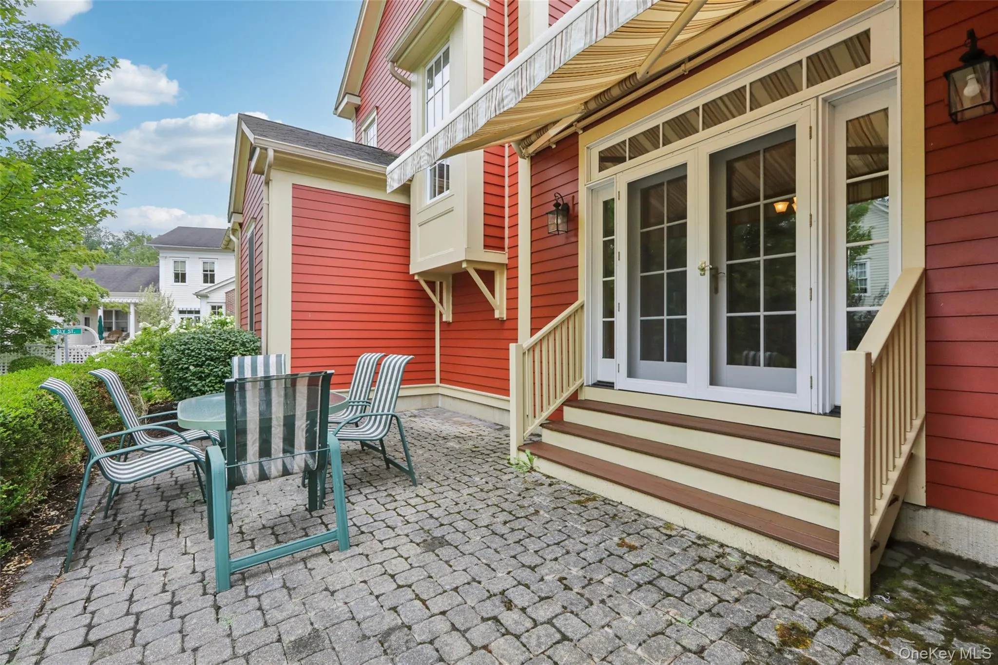 Step down from the Dining Room to enjoy this private paver patio with a remote controlled awning Step down from the Dining Room to enjoy this private paver patio with a remote controlled awning