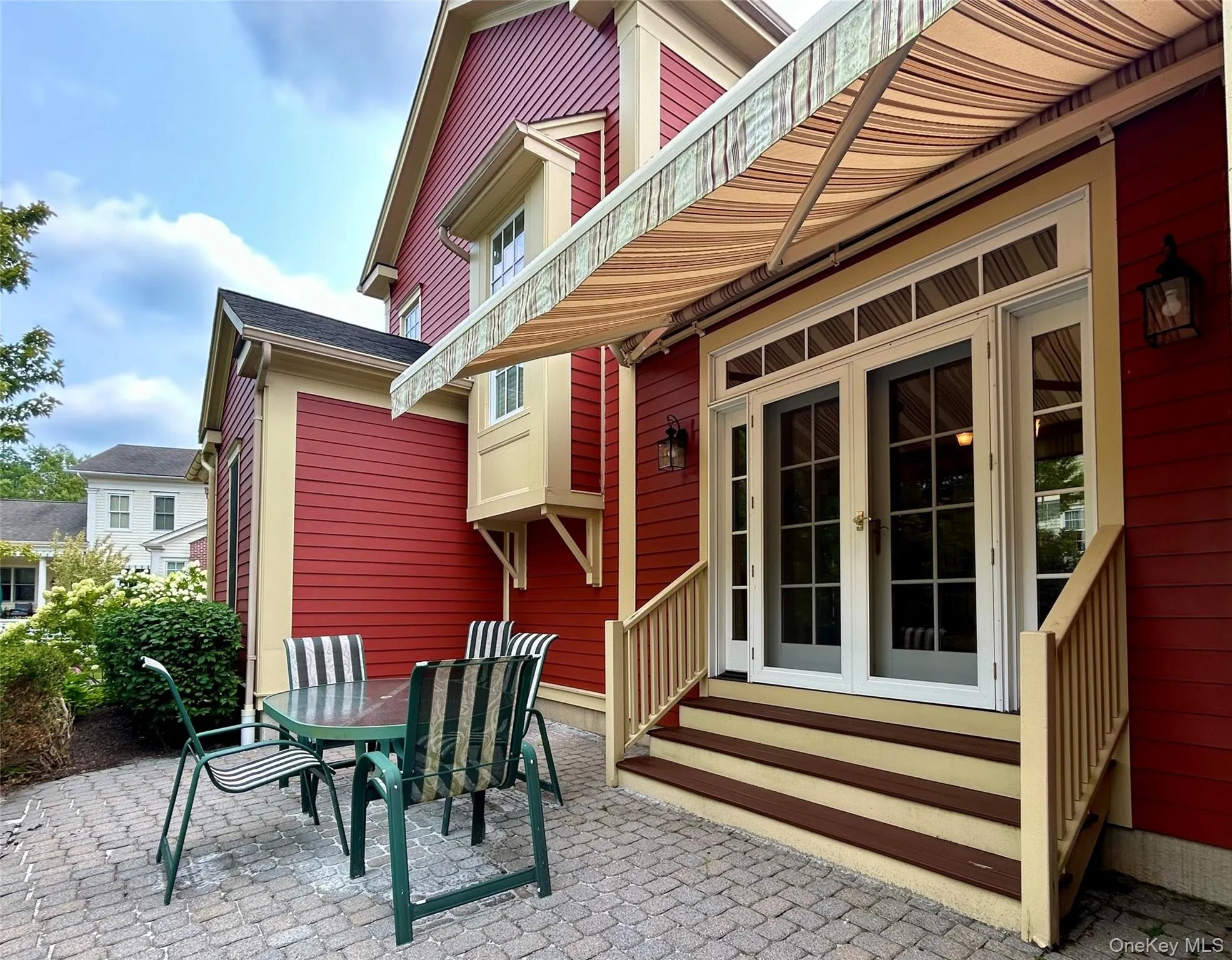 Step down from the Dining Room to enjoy this private paver patio with a remote controlled awning Step down from the Dining Room to enjoy this private paver patio with a remote controlled awning