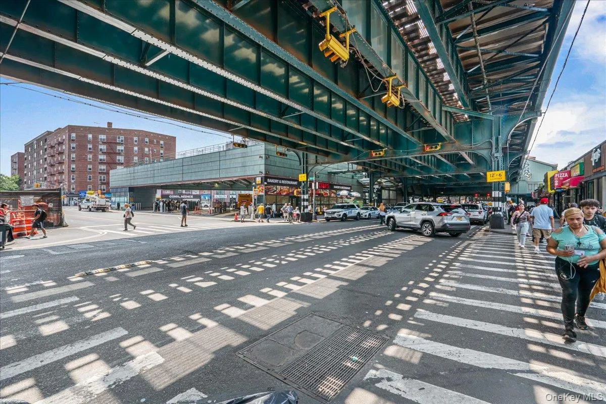 View of asphalt road with street lights View of asphalt road with street lights