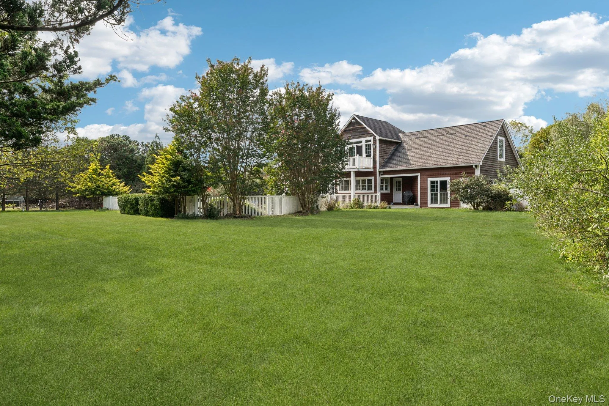 The rear elevation of the home presents a harmonious blend of comfort and sophistication. The rear elevation of the home presents a harmonious blend of comfort and sophistication.