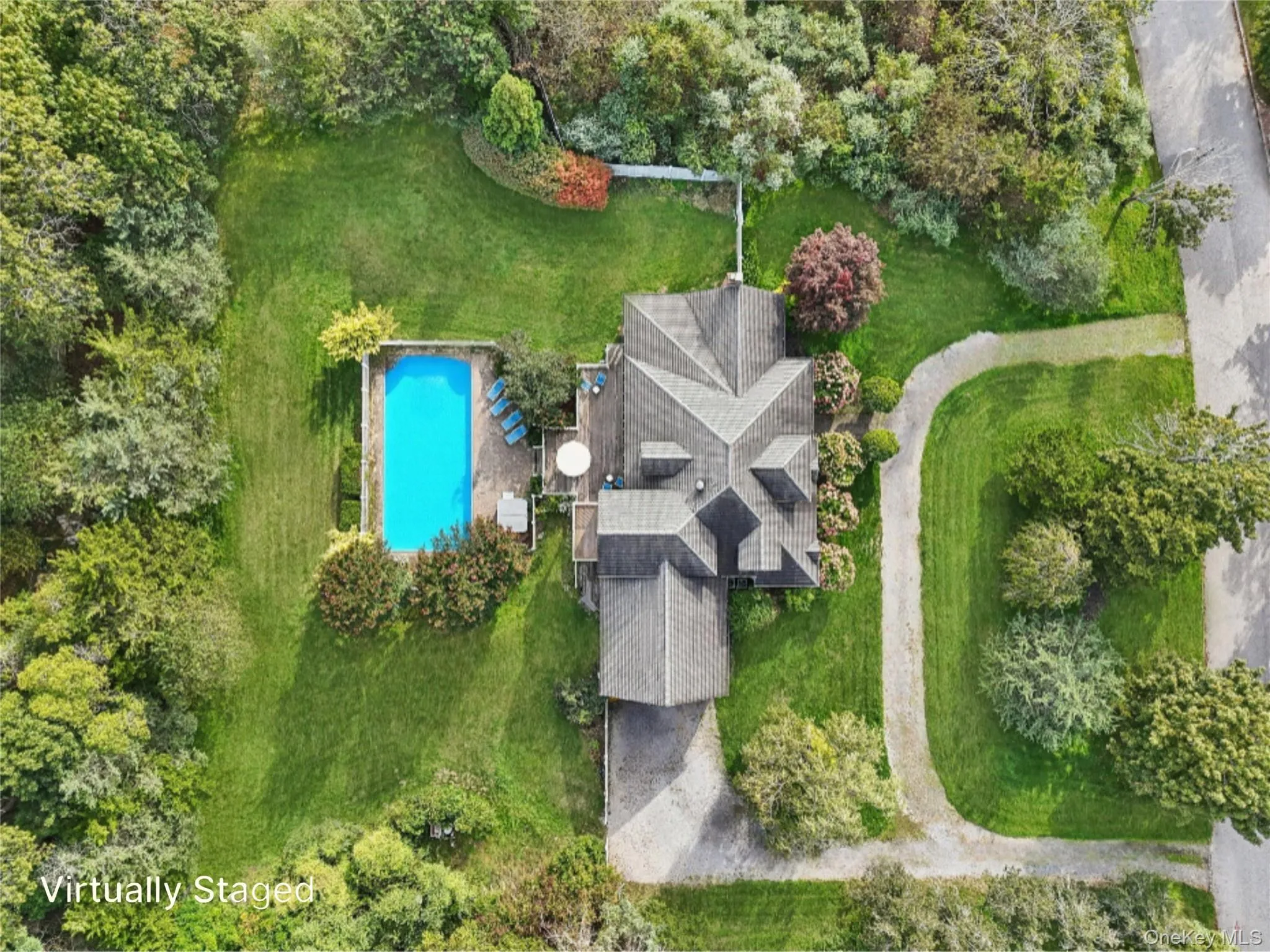 A breathtaking aerial view capturing the full scope and beauty of the property. Virtually Staged to show open pool. Virtually Staged to show open pool. A breathtaking aerial view capturing the full scope and beauty of the property. Virtually Staged to show open pool. Virtually Staged to show open pool.