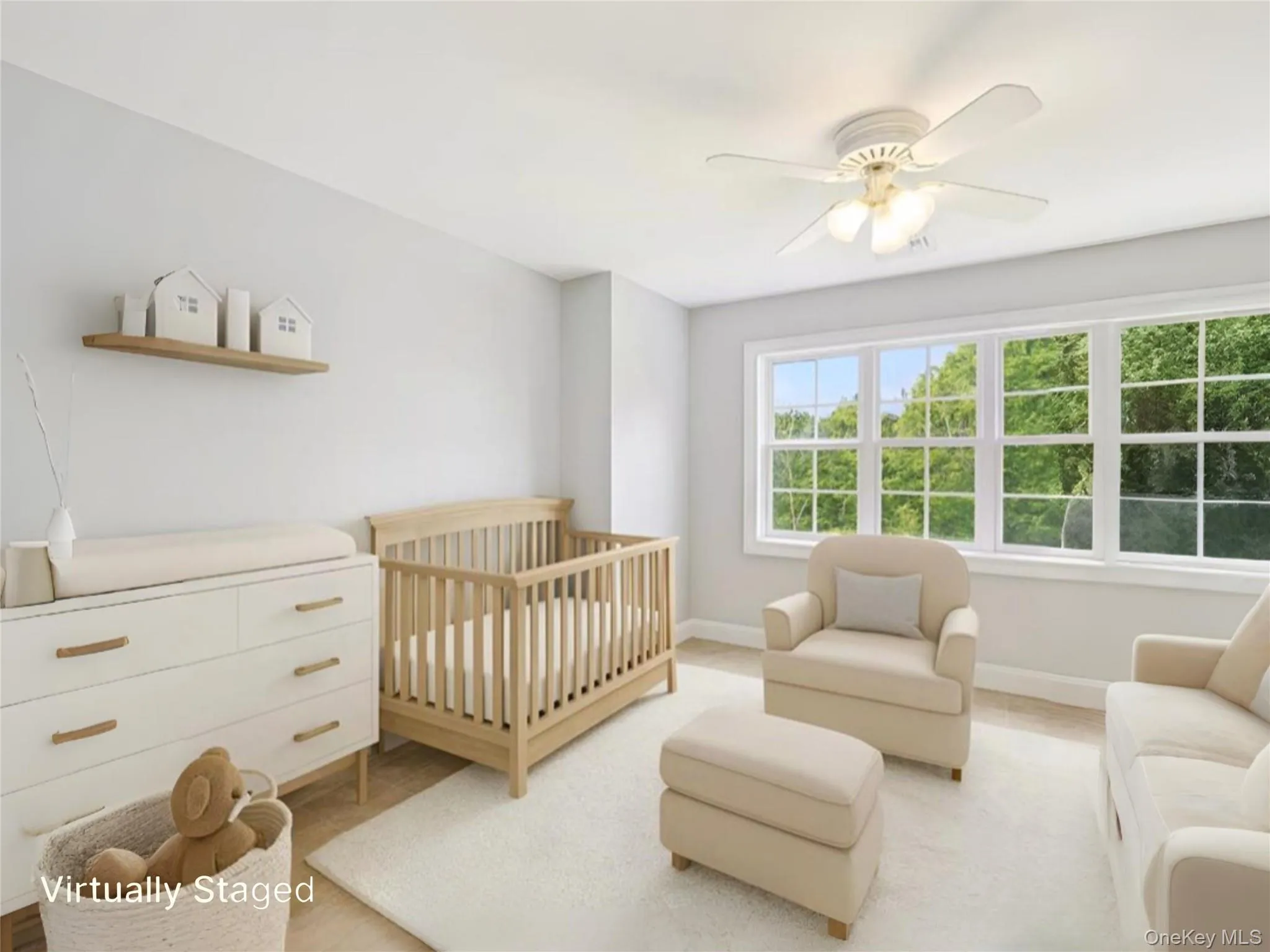 Versatile bedroom on the upper level, currently styled as an nursery. Versatile bedroom on the upper level, currently styled as an nursery.