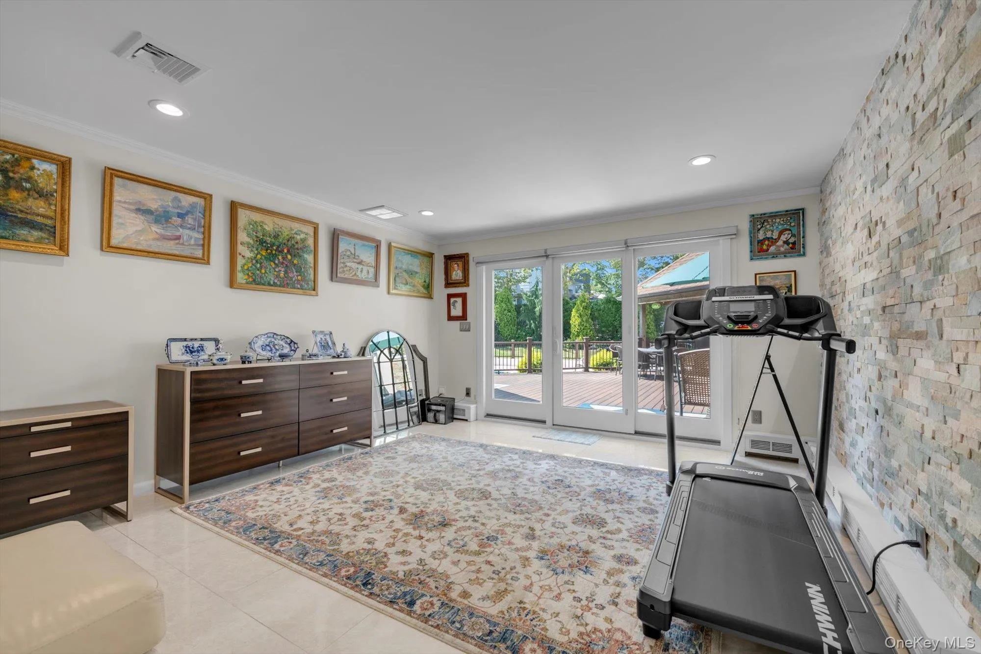 Main floor Bedroom or office with crown molding, light tile patterned floors, and recessed lighting Main floor Bedroom or office with crown molding, light tile patterned floors, and recessed lighting