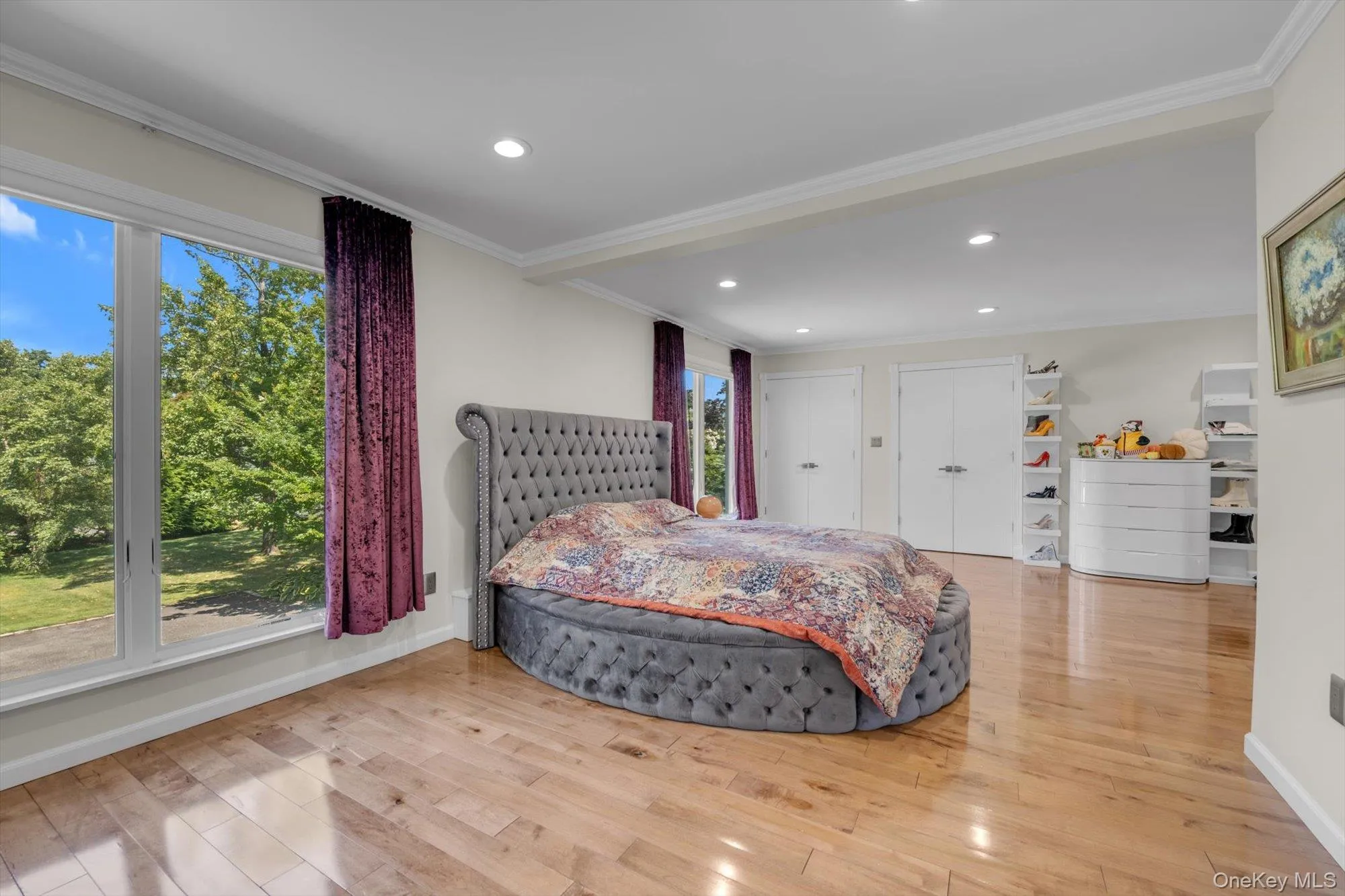Upper Level Bedroom(Can Be Primary) with ornamental molding, wood finished floors, and recessed lighting Upper Level Bedroom(Can Be Primary) with ornamental molding, wood finished floors, and recessed lighting