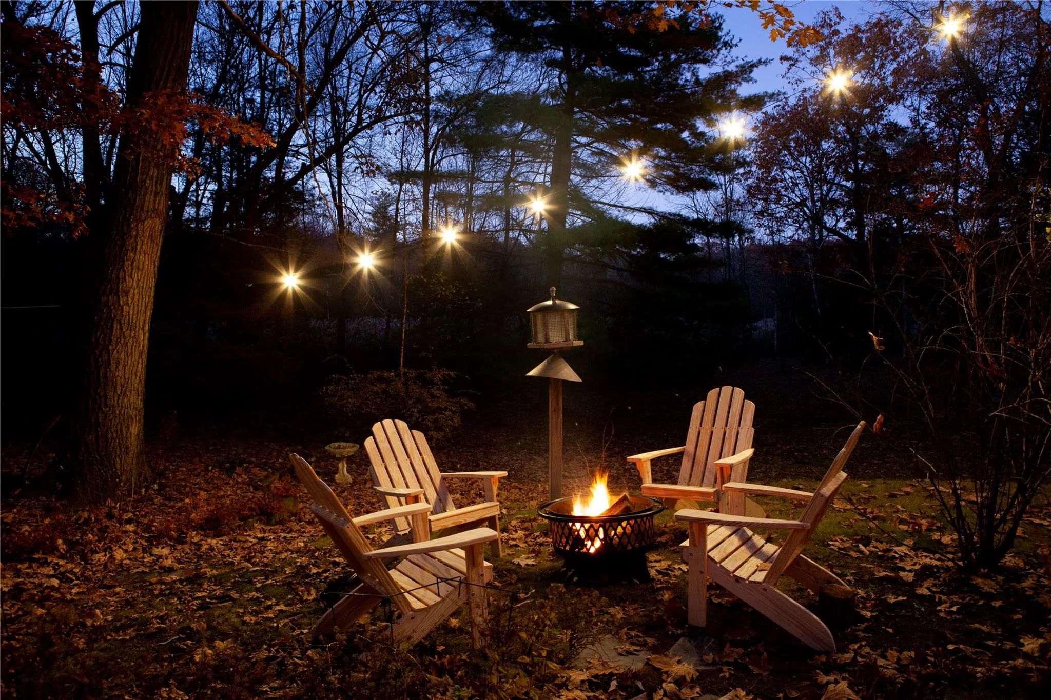 View of yard with a fire pit View of yard with a fire pit