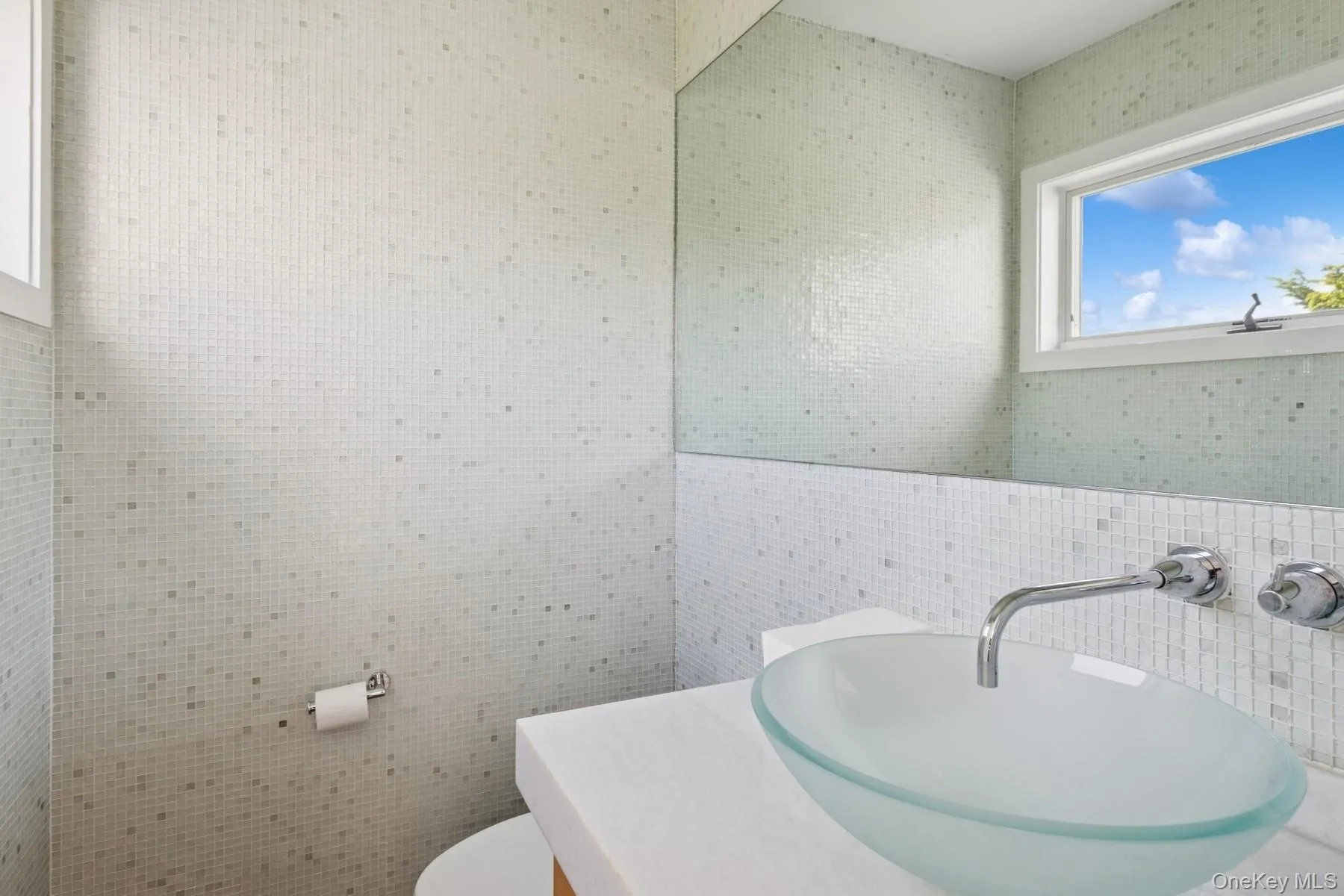 Bathroom with tile walls and vanity Bathroom with tile walls and vanity