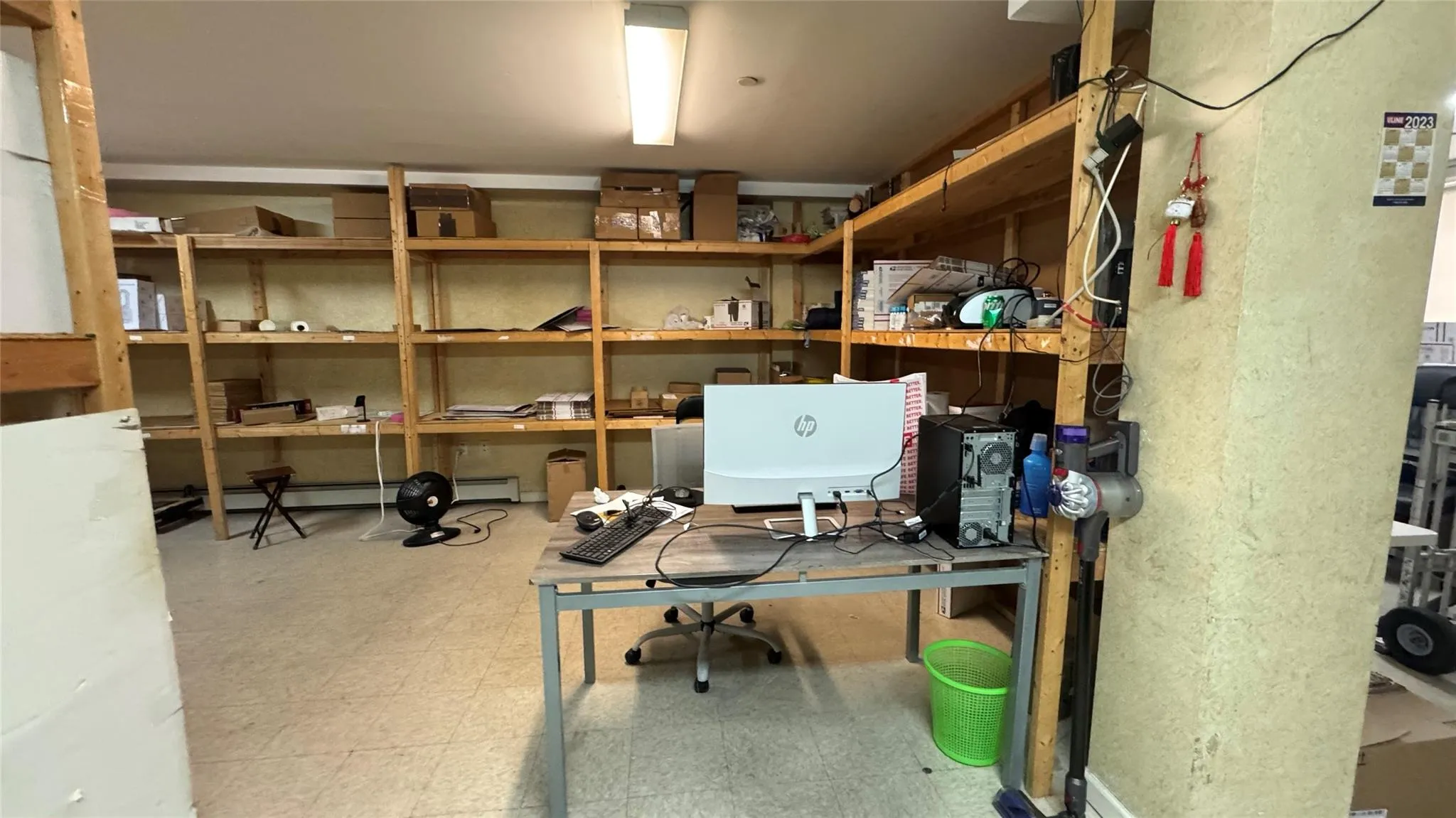 Office space featuring tile patterned floors and baseboard heating Office space featuring tile patterned floors and baseboard heating