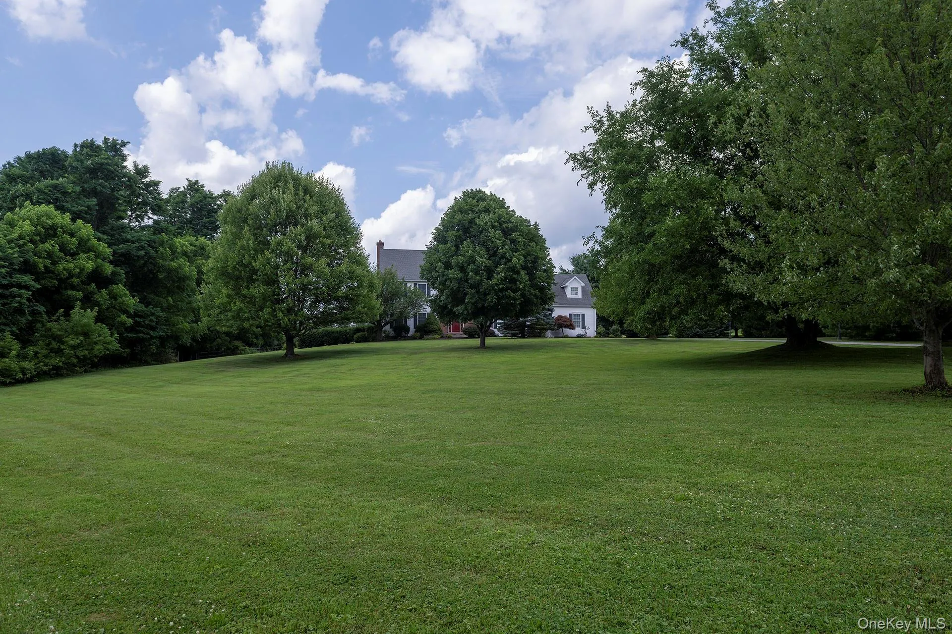 House set well off the road with beautiful front yard House set well off the road with beautiful front yard
