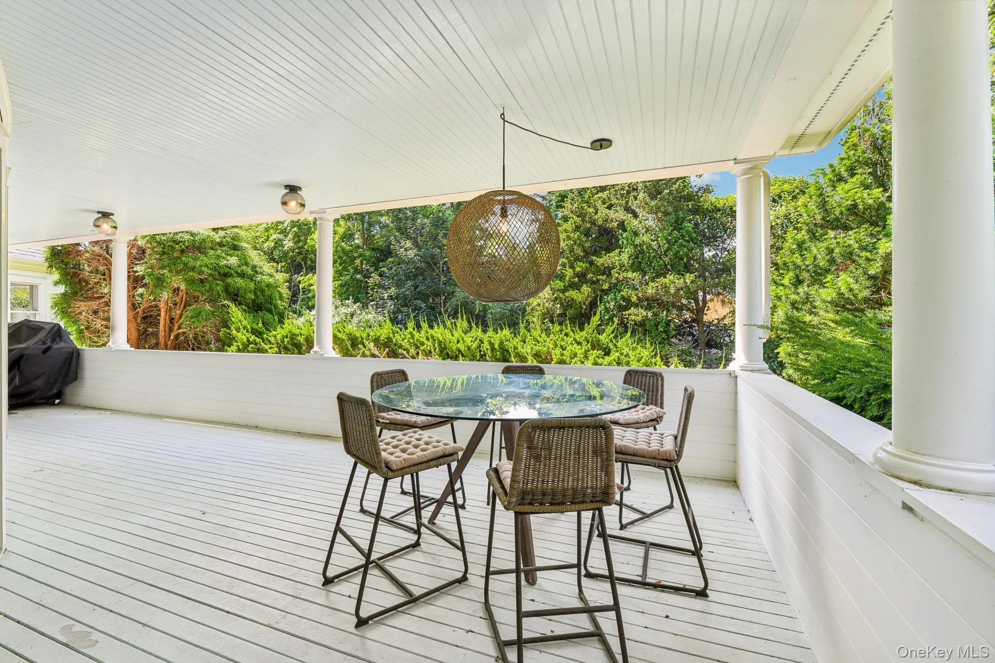 Wooden terrace featuring outdoor dining area Wooden terrace featuring outdoor dining area