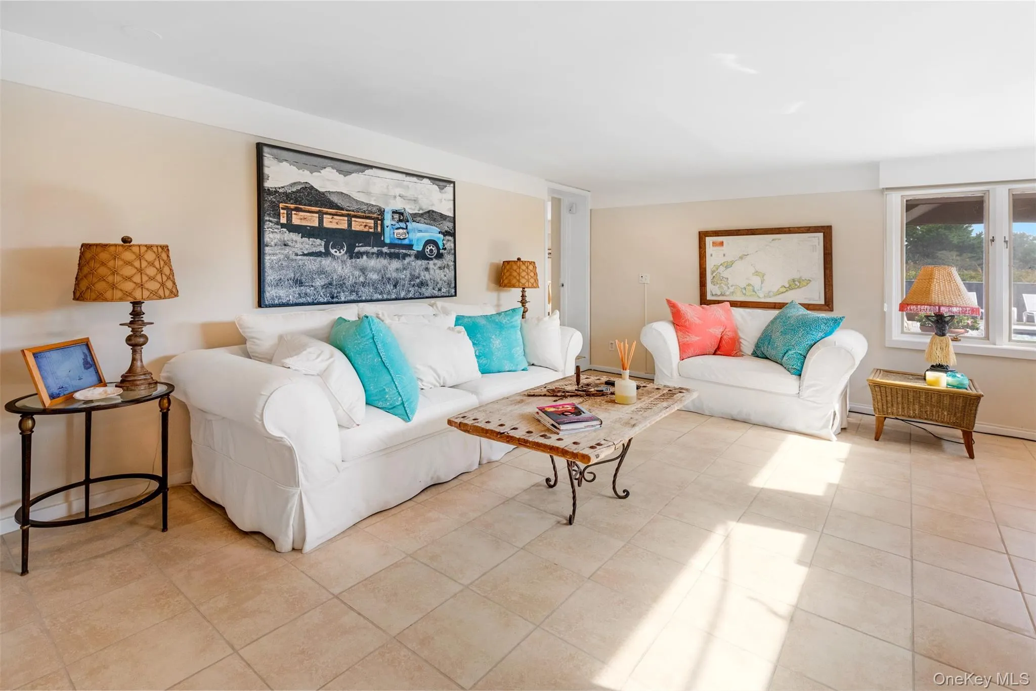 Living area featuring light tile patterned floors Living area featuring light tile patterned floors