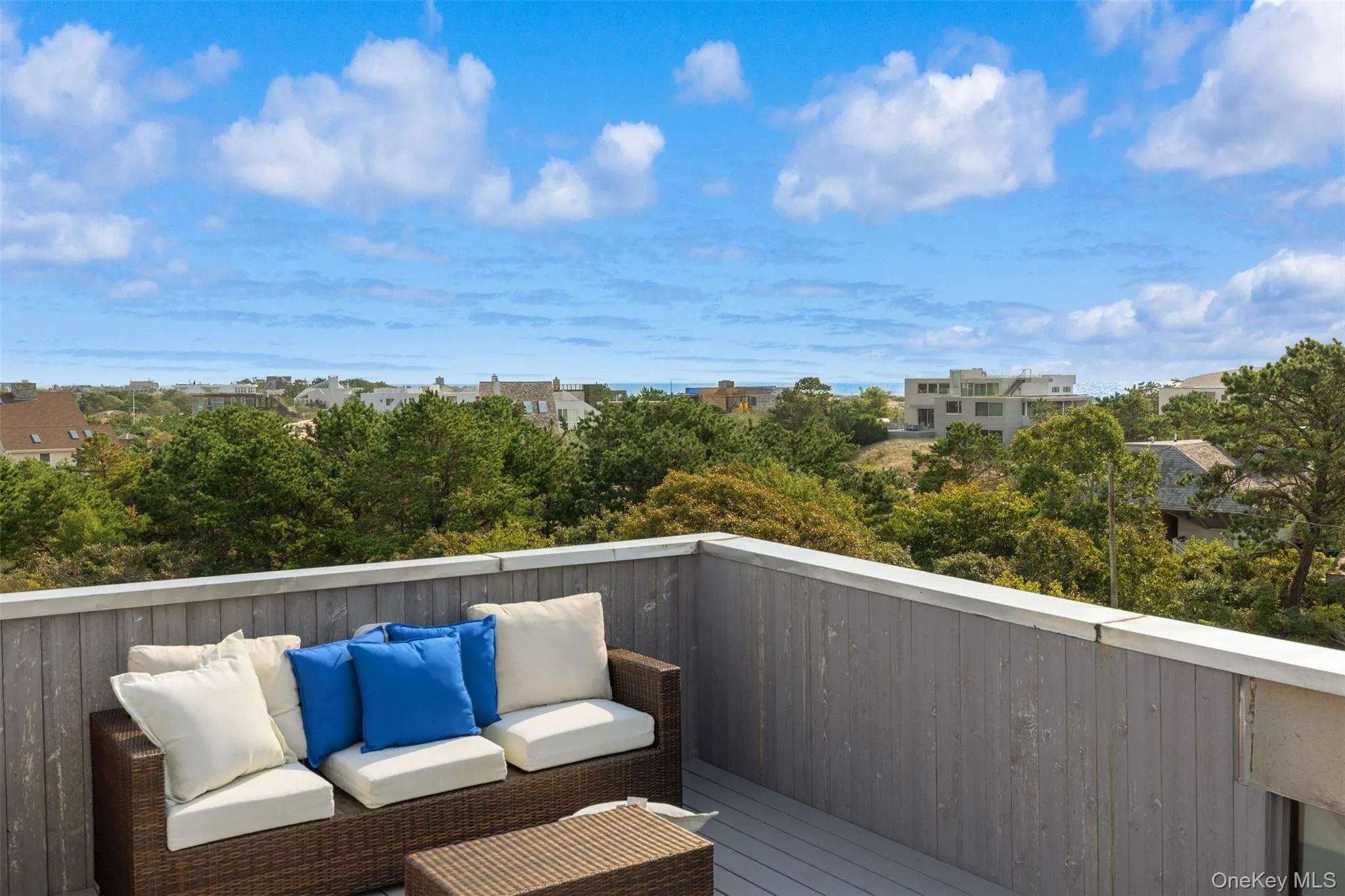 Wooden terrace featuring outdoor lounge area Wooden terrace featuring outdoor lounge area