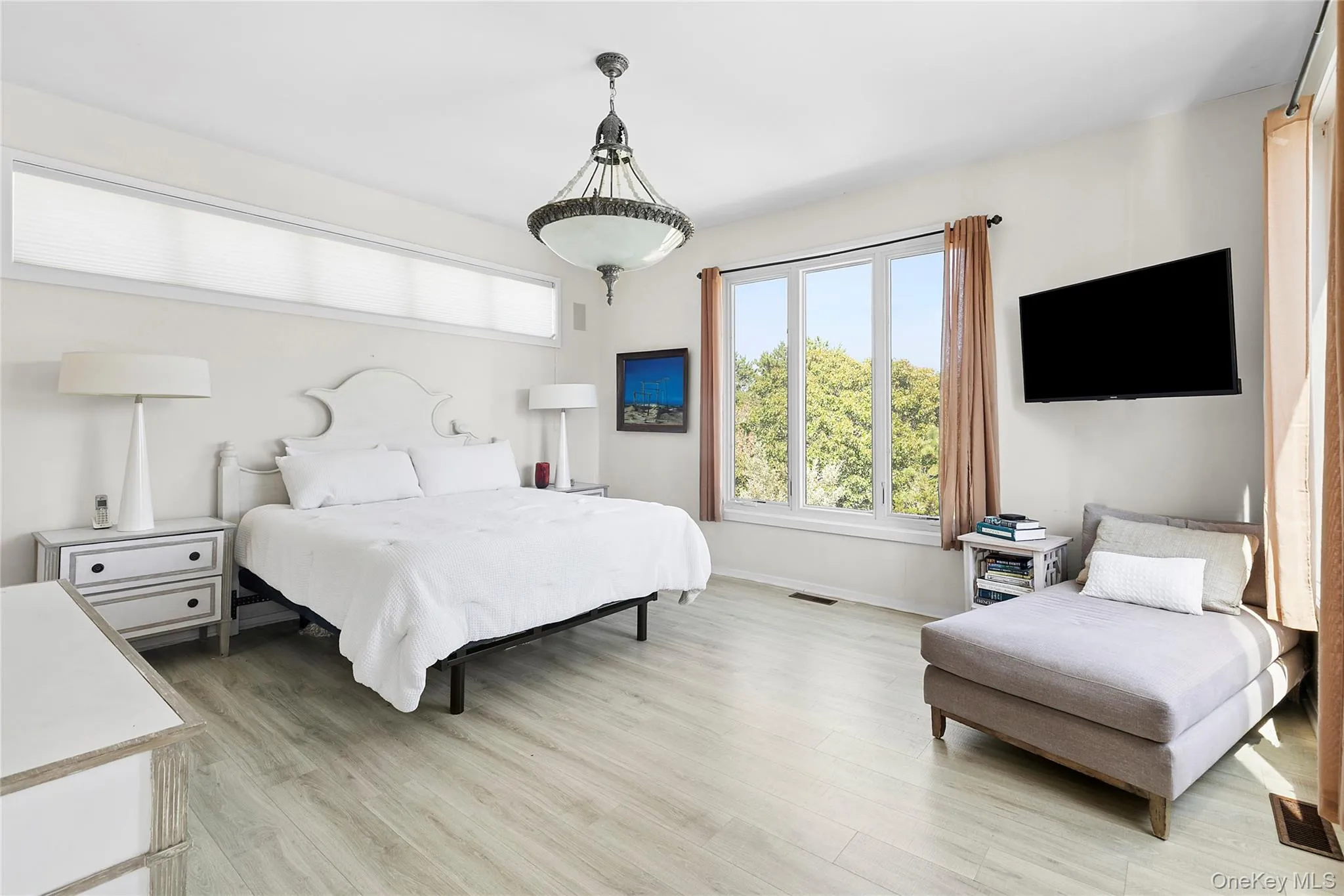 Bedroom with light wood-type flooring Bedroom with light wood-type flooring