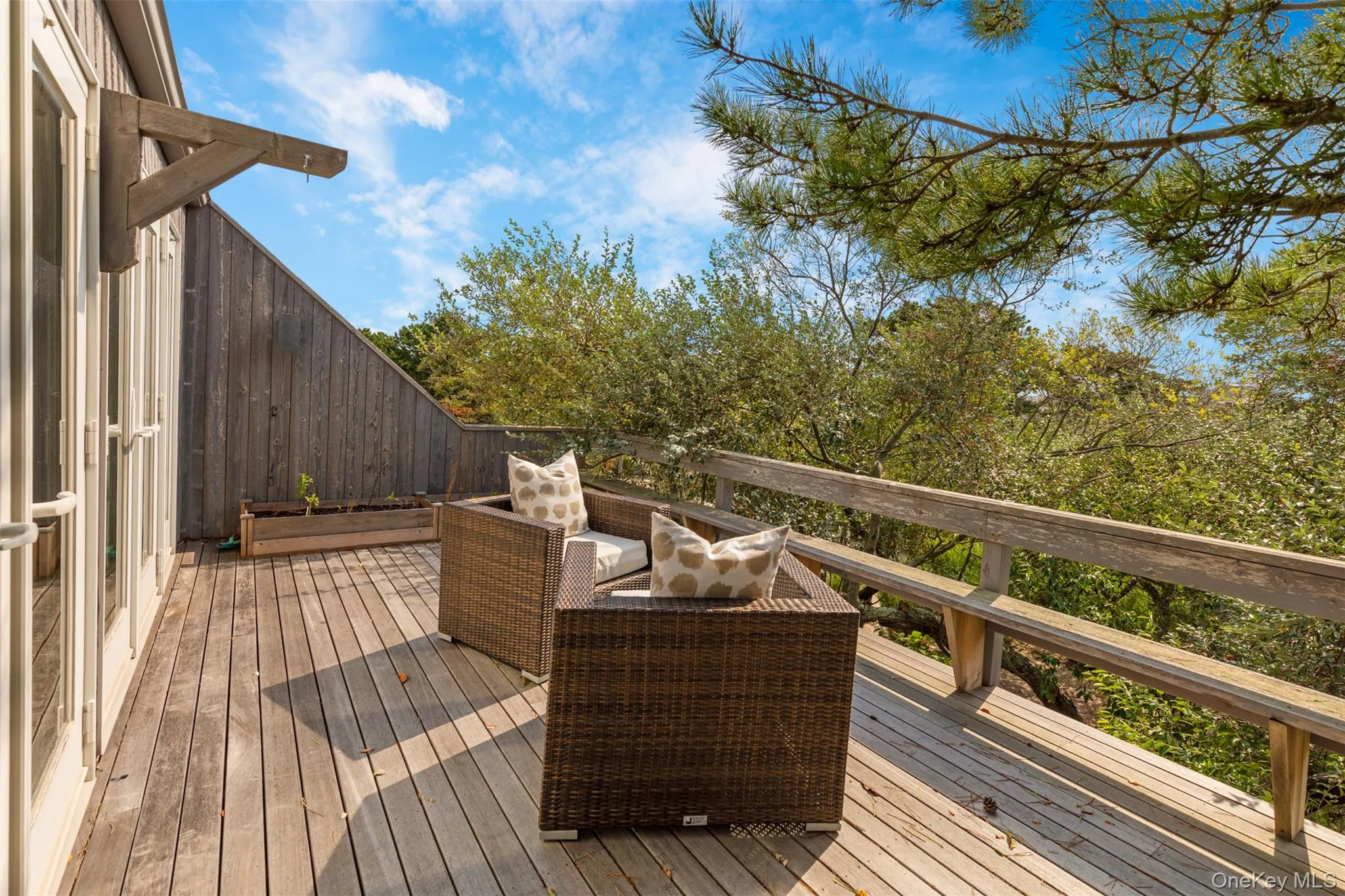 Wooden terrace featuring outdoor lounge area Wooden terrace featuring outdoor lounge area