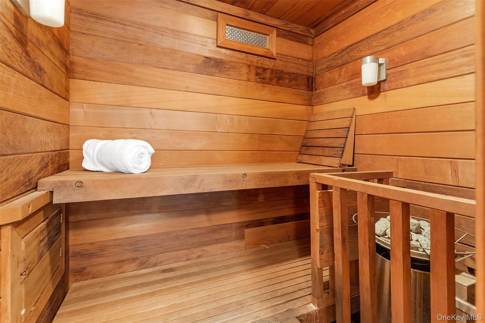 Sauna / steam room featuring wooden walls Sauna / steam room featuring wooden walls