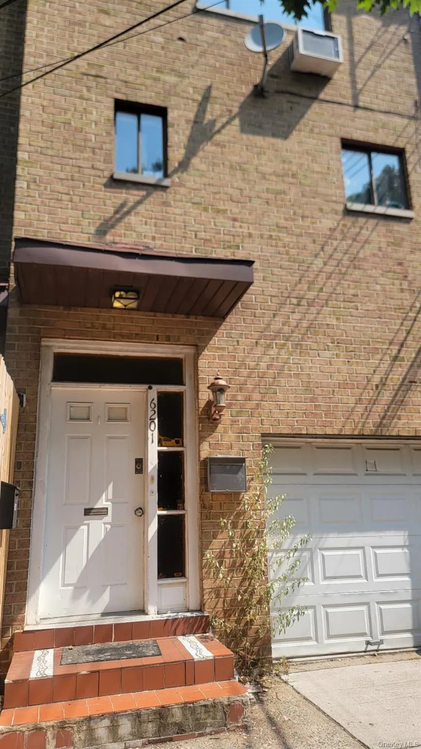 Entrance to property featuring brick siding Entrance to property featuring brick siding